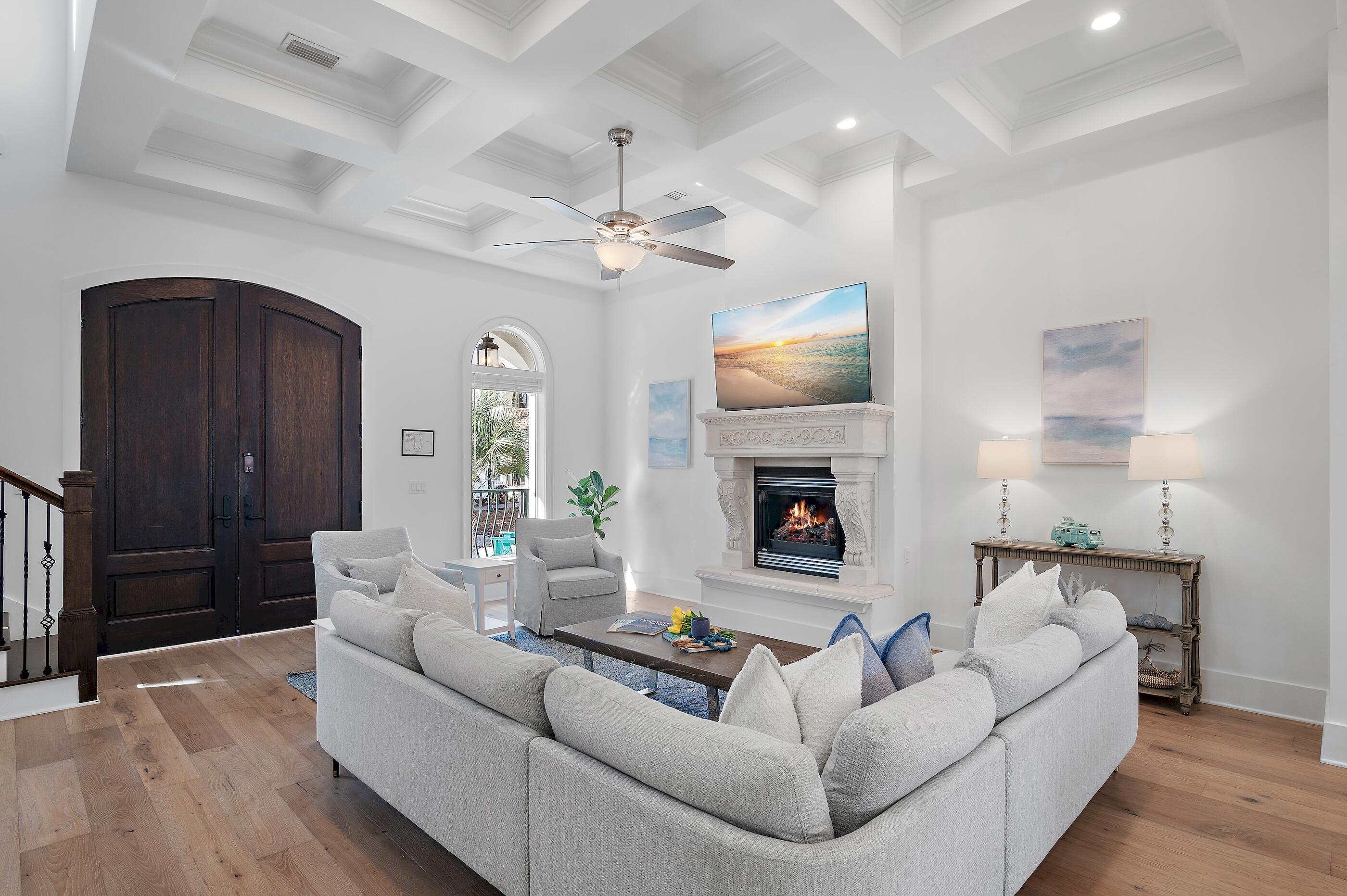 Residing behind the private gated enclave of Palmeira Villas in Seagrove Beach, this newly constructed 'Coastyle' designed home executed by the renowned team at Kirby Construction seamlessly blends organic aesthetics with a modern and coastal flair. The heart of the home immediately unfolds upon initial entry with a sophisticated and luxurious living space meticulously planned for both relaxation and entertainment. Soaring 12' coffered ceilings coupled with stunning French Oak hardwoods and an abundance of natural light infuse the space with coastal ambiance. Ideal for culinary enthusiasts, the gourmet kitchen encompasses custom cabinetry, Carrera quartz countertops and an extended kitchen island with integrated seating. Preparing a morning beverage or evening night cap is made possible by the fully equipped wet bar. Beckoning for those outdoor gatherings, the backyard oasis is perfect for those summer days and evenings with a new covered pergola, firepit and private pool. Ascending the striking staircase, a junior suite offers soaring ceilings, beautiful hardwood flooring and a private-ensuite. A laundry, bunk room and guest suite with private access to a private patio share a jack-and-jill bath and complete the 2nd level.
Encompassing over ?? of the top floor, the primary suite offers custom vaulted ceilings with wood accents and a private covered patio. The luxurious ensuite bath is designed for a spa-like experience with a garden-style soaking tub, dual vanities, a large walk-in wet room and an enclosed water closet. An additional guest suite with private bath and access to the covered porch and wet bar servicing both suites complete the top level. Impressive rental potential of $90,000/year coupled with the custom finishes, upgrades and turn-key configuration makes this a compelling opportunity for both investors and second or full-time residents alike.
The sought-after community of Palmeira Villas in Seagrove Beach on 30A provides residents with a quick 2 minute walk to the beach, heightened privacy, and an array of amenities while remaining geographically poised near all of the acclaimed dining and entertainment venues 30A has to offer including the newly opened Greenway Station town centers. Inquire today to arrange a viewing and start envisioning the coastal lifestyle you deserve.