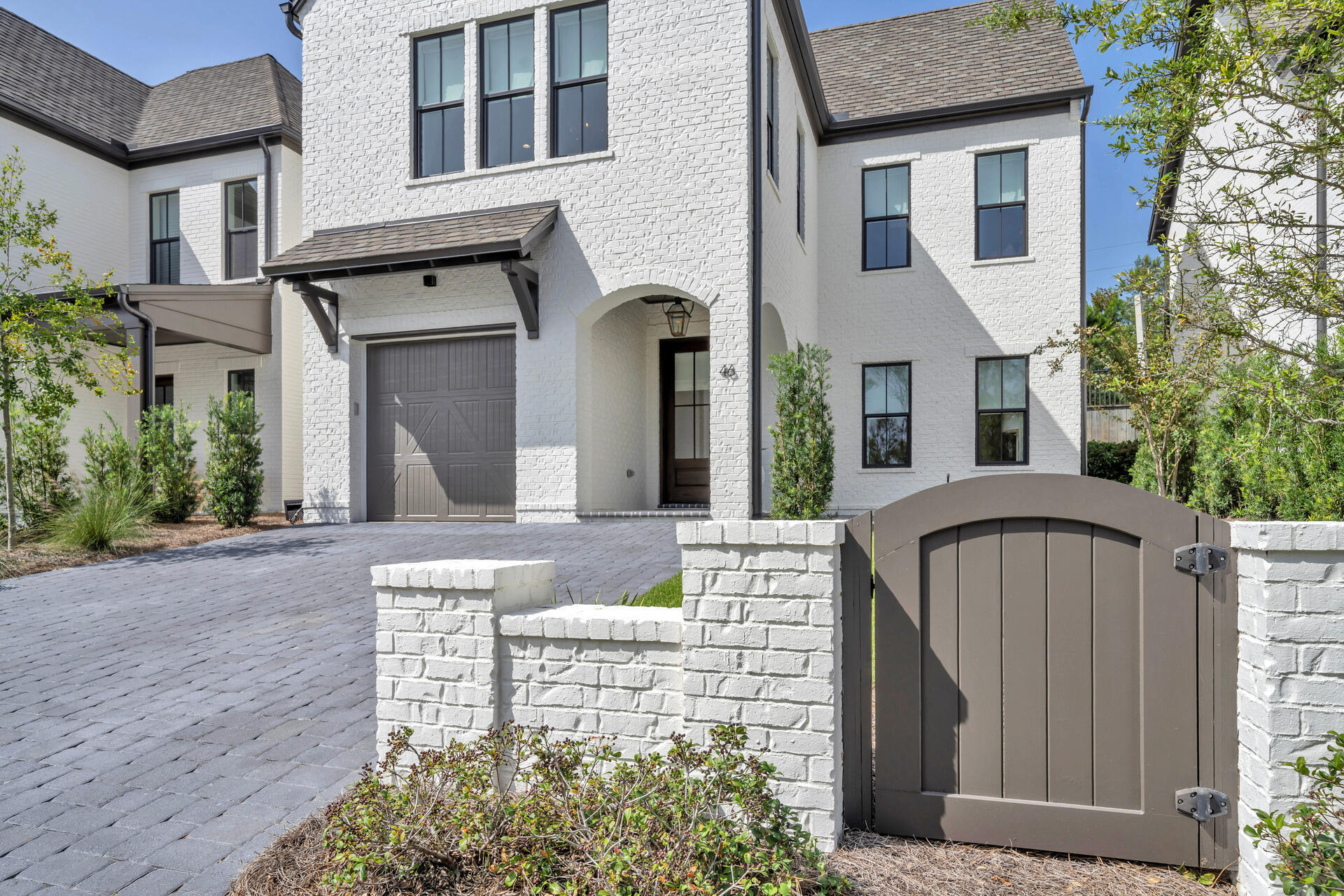 You won't find a better value on 30A!  Welcome to the epitome of 30A luxury living in RidgeWalk. This residence was completed in 2022 by Randy Wise Homes and is a true masterpiece. There are a wealth of builder/owner upgrades and enhancements which make this beach home special. This stunning home features a brick accent wall in the living room, exuding warmth and character, and an extended living area, providing ample space for gatherings and entertainment. Impress your guests with an outdoor kitchen, perfect for al fresco dining and barbecues. The inside kitchen boasts Viking appliances, quartz countertops, and kitchen island with bar seating. Upstairs the primary suite exudes elegance with shiplap detailing, creating a cozy retreat. The many enhancements include high-end after market light fixtures, custom window treatments, exquisite wallpaper in the master bathroom and downstairs powder room, custom-built closets in the master bedroom and guest room for enhanced storage and organization, and custom queen bunks in the guest room, adding a unique and practical touch. The garage offers a perfect solution for additional parking and storage and even has an upgraded epoxy flooring.  Enjoy quick and easy access to the beach which is just 0.8 miles away. The RidgeWalk community itself offers gated access, a luxurious community pool, and tasteful landscaping, enhancing its beauty and serenity.  Lawn maintenance is covered by the HOA!

The area of 30A and 393 South offers so much with the Ed Walline Beach Access, shopping at Gulf Place, dining at Shunk Gulley, The Perfect Pig, Pizza By The Sea, and so much more all within 1 mile. 
Don't miss the opportunity to own this beautiful beach home in RidgeWalk!
