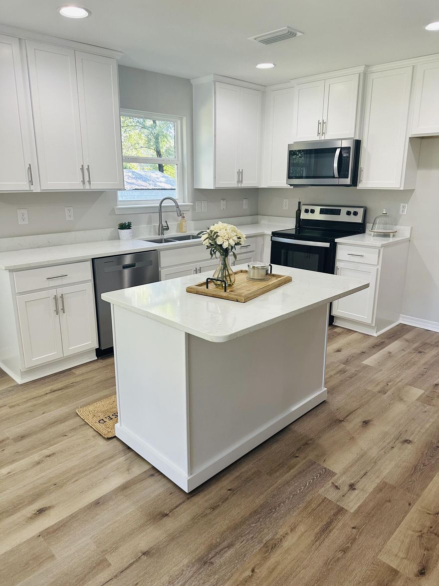 Professional Photos October 5th. No Monthly HOA fees, No city taxes. This 4 bedroom 2 bath was just completed by a Parade of Homes Award Winning Builder. The home features Luxury Vinyl Plank Flooring. Upgraded black and bronze plumbing and door hardware, 2 car garage with automatic opener and pull down attic stairs.