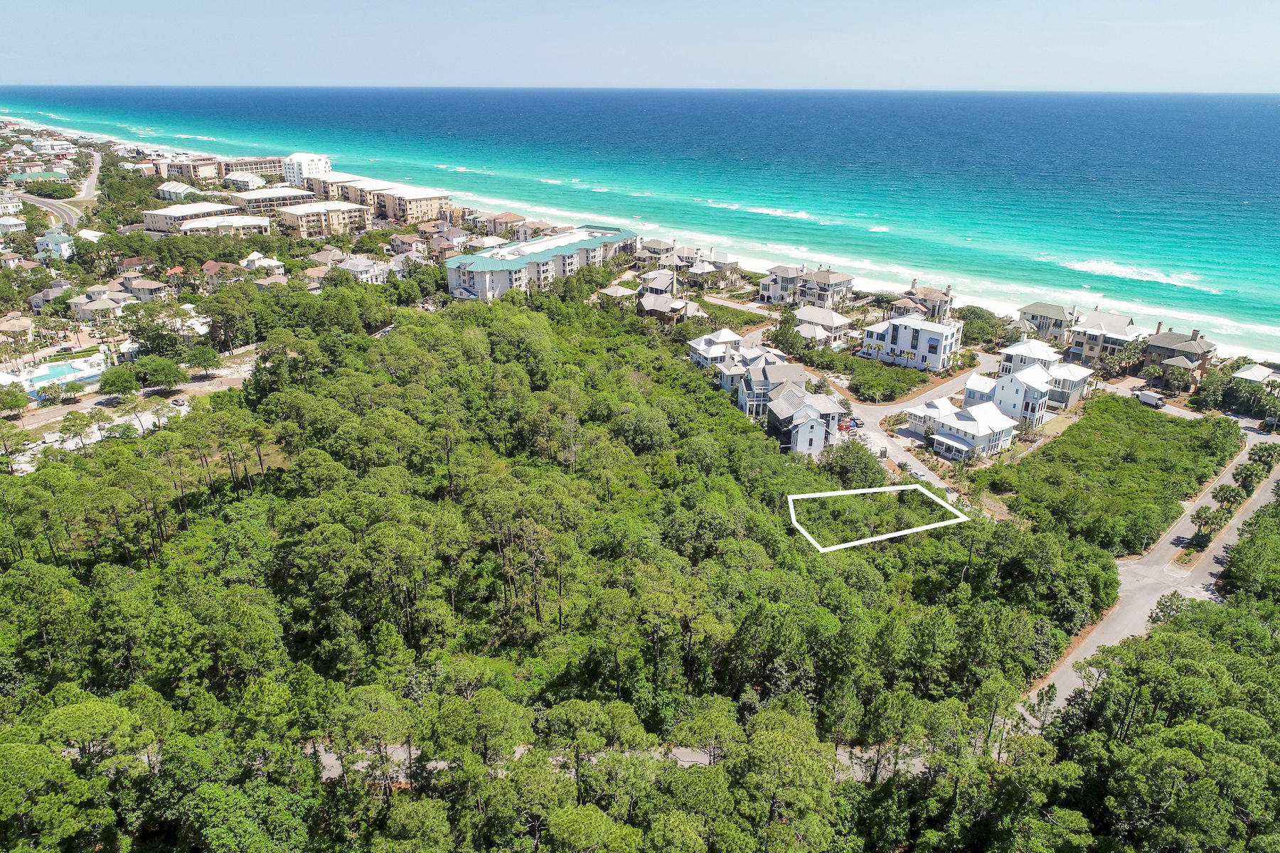 The Retreat Offers Premium Home Site for Luxury Beach Home! Bring your beach home dream to this Santa Rosa Beach lot less than two blocks from the sugar white sandy beach and emerald green Gulf of Mexico waters. Nestled into the gated community named The Retreat, the space fits the bill for the perfect beach retreat. You can relax to the max and entertain and enjoy friends and family in the comfort of a home that you have selectively designed for size, style, amenities, space and color. Luxury homes are the hallmark here with an intriguing blend of architectural styles inspired by Bermuda, the Caribbean, a little low country Cajun and some French and Spanish colonial.