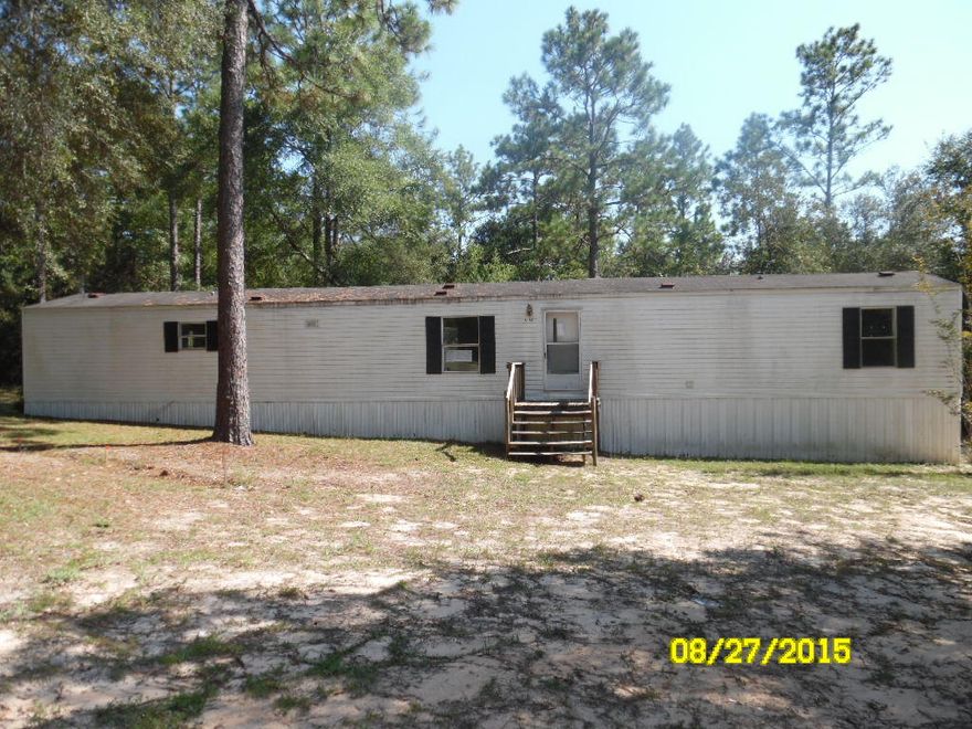 HUD Case# 091428201, Uninsurable (UI), Sold As-Is. Equal Housing Opportunity: HUD properties are offered for sale to qualified purchasers without regard to the prospective purchaser's race, color, religion, sex, disability, familial status, or national origin. Welcome to Crestview, FL!!! This mobile home sits on virtually 1 acre of property in peaceful rural community setting. Features a living room, open kitchen with adjoining dining room, master suite with standard tub/shower combo. Home needs some updating- flooring, painting, and appliances and other minor repairs/replacements- Seller will pay up to 3% of Buyer closing costs with acceptable offer.