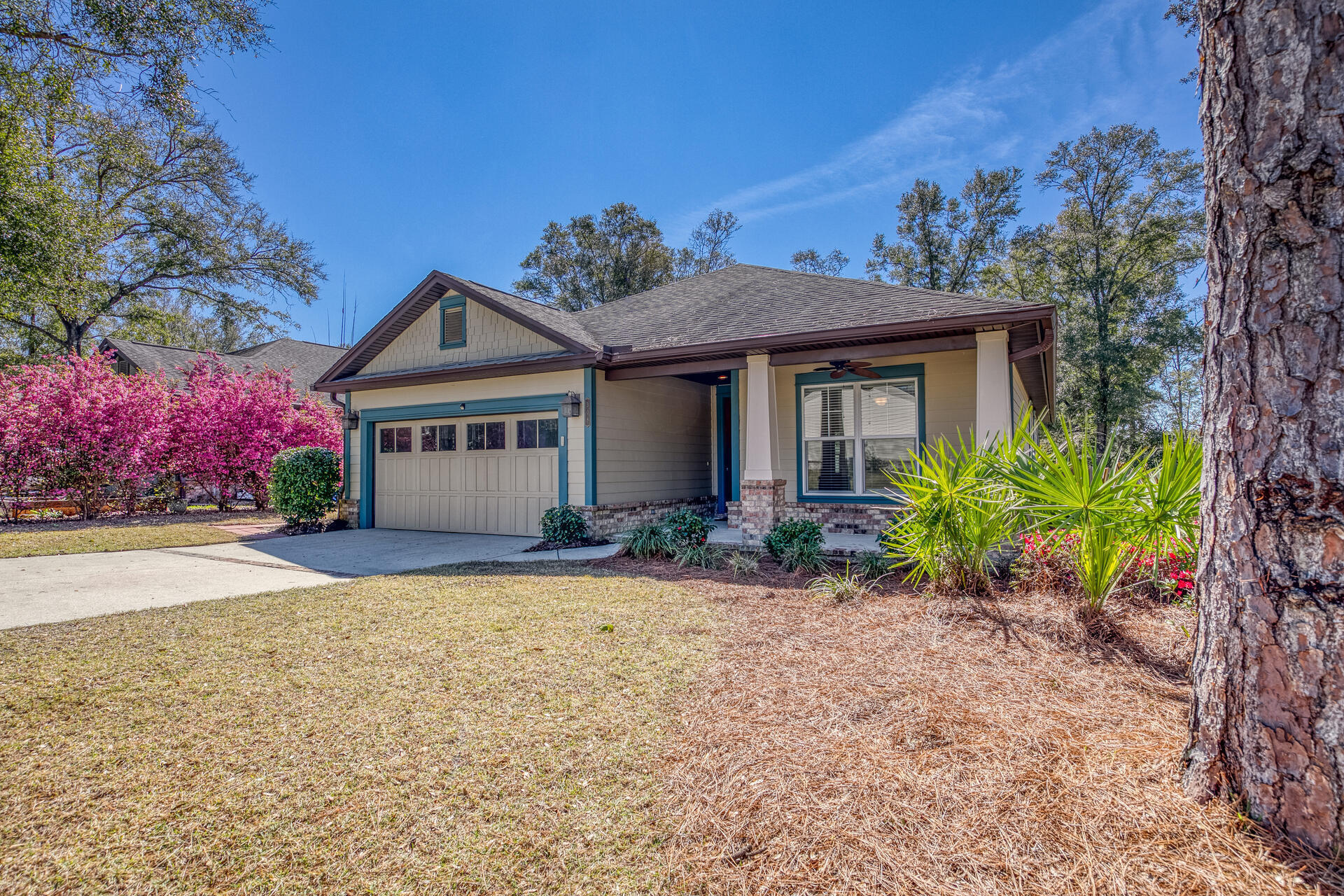 Wow! This one is a must see. Tile floors throughout, 10-foot ceilings, 8-foot doors, granite, stainless and clean! Beautiful yard with citrus and jasmine! This well-maintained Huff built home in The Canopies of Freeport is MOVE IN READY! Located minutes from everything the Emerald Coast has to offer, this home is situated a corner lot with newly fenced backyard, screened back porch. The neighborhood pool is nearby however, this large lot has plenty of room for a private pool. Do not wait to schedule your tour!