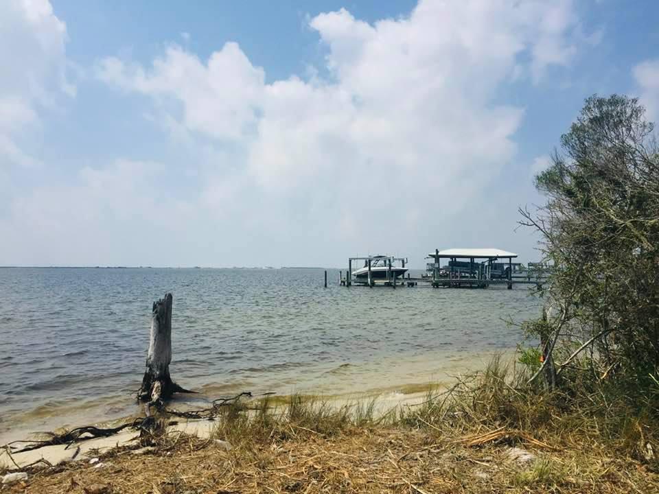 BUILD YOUR DREAM HOME HERE! This waterfront property is 1.29 acres and has 114 feet of Santa Rosa Sound shoreline '' spectacular views and access to deep water included. While the property is set back from major roadways and the hustle bustle of town, it is also convenient to great restaurants, shopping, and world class beaches. The lot has been partially cleared and new survey can be found in the documents section. Visit this great property today!