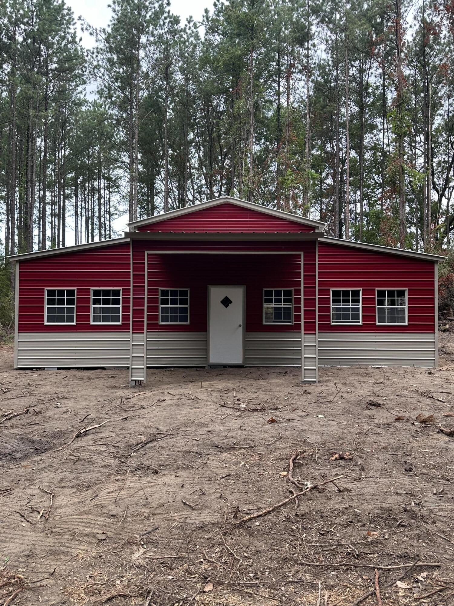 5.12 beautiful wooded acres with lots of privacy with appx 2 acres cleared and underground power has been run to the property.   Yearly  fees are $400/yr restrictions under documents.  A 30'x36' storage building is included.  Property is located just NE of Ponce de Leon, FL.    Appx. 40 minutes to the South Walton Beaches or Panama City Beaches then back home to your quiet place.  I-10 exit within 10 minutes.