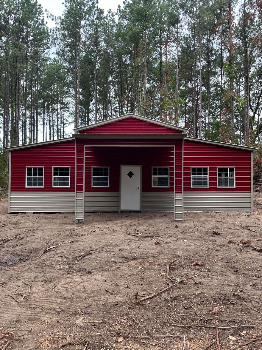 SUPER REDUCTION IN PRICE ON THIS 5.12 beautiful wooded acres with lots of privacy with appx 2 acres cleared and underground power has been run to the property.   Yearly  HOA fees are $400/yr. (please review restrictions under Document tab above).  A 30'x36' Storage building with dirt floor is included. Concrete can still be poured inside.  Restrictions do not permit living in it  as a tiny house, but will make great storage while you build your dream home.  Manufactured homes nor RV's not permitted.  Property is located just NE of Ponce de Leon, FL.    Appx. 40 minutes to the South Walton Beaches or Panama City Beaches then back home to your quiet place.  I-10 exit within 10 minutes.