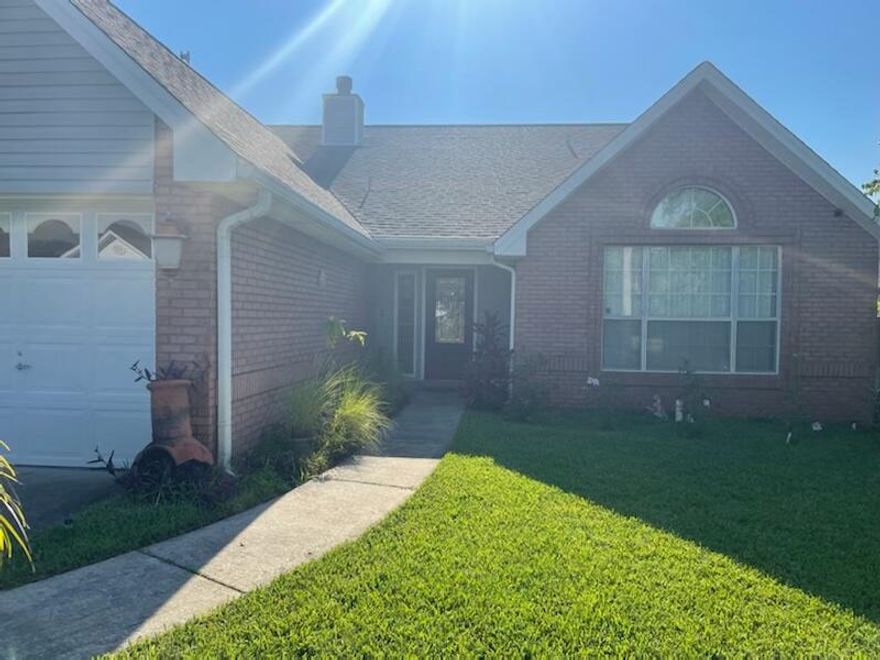 Beautiful open floor plan with glass across the back side of house perfect for entertaining with private pool area. 14 ft. ceilings with fireplace and art shelving. Call today for preview. Brand new 30 dimensional roof with new paint, carpet/tile and light fixtures. Plenty of storage, two car garage. Owner licensed Realtor.