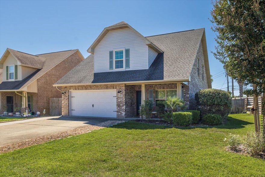 Nestled in Soundside Moorings on the Santa Rosa Sound, this stunning 4-bedroom, 3-bathroom residence is available on a large corner lot on cul-de-sac. Dining and kitchen at front of house boasting granite countertops, freshly painted cabinets, and island with bar top. The master suite is upstairs with en-suite bathroom complete with dual vanities, a soaking tub, and a separate shower. Three additional bedrooms and two additional full bathrooms provide versatility for occupancy. Fully fenced and manicured back yard with large patio and mature fruiting trees. Community common area includes a beach area, perfect for launching a kayak, canoe, or paddleboard. Fenced, paved area on side of house allows for hidden storage of waste cans or small watercraft. Available fully-furnished as shown in photos. Has 5.0 star rating across 17 stays on a popular short term rental platform. Vacation, rental, or investment property ready!