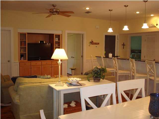 Magnolia Cottage by the Sea. Conveniently located on scenic Hwy 30A and a world away from the crowded ???spring break and summer party scenes,??? pure enjoyment and tranquility are what you will find here. Indulge yourself in the quiet serenity of white sand beaches, nap by the pool which is just steps away or relax on your private screened-in porch, where the natural aroma therapy of the surrounding Florida Pines will soothe you into a stress-free state of mind.