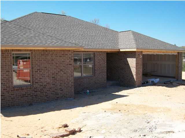 NEW BRICK HOME LOCATED WITHIN WALKING DISTANCE OF WALKER ELEMENTARY SCHOOL. THERE ARE MANY UPGRADES, TRAYED CEILINGS, TILED FLOORS, STAINLESS STEEL APPLIANCES AND GRANITE COUNTERTOPS. THIS HOUSE HAS 3 BEDROOMS PLUS A LARGE MASTER SUITE. A MASTER BATH WITH A GARDEN TUB AND WALK-IN SHOWER.