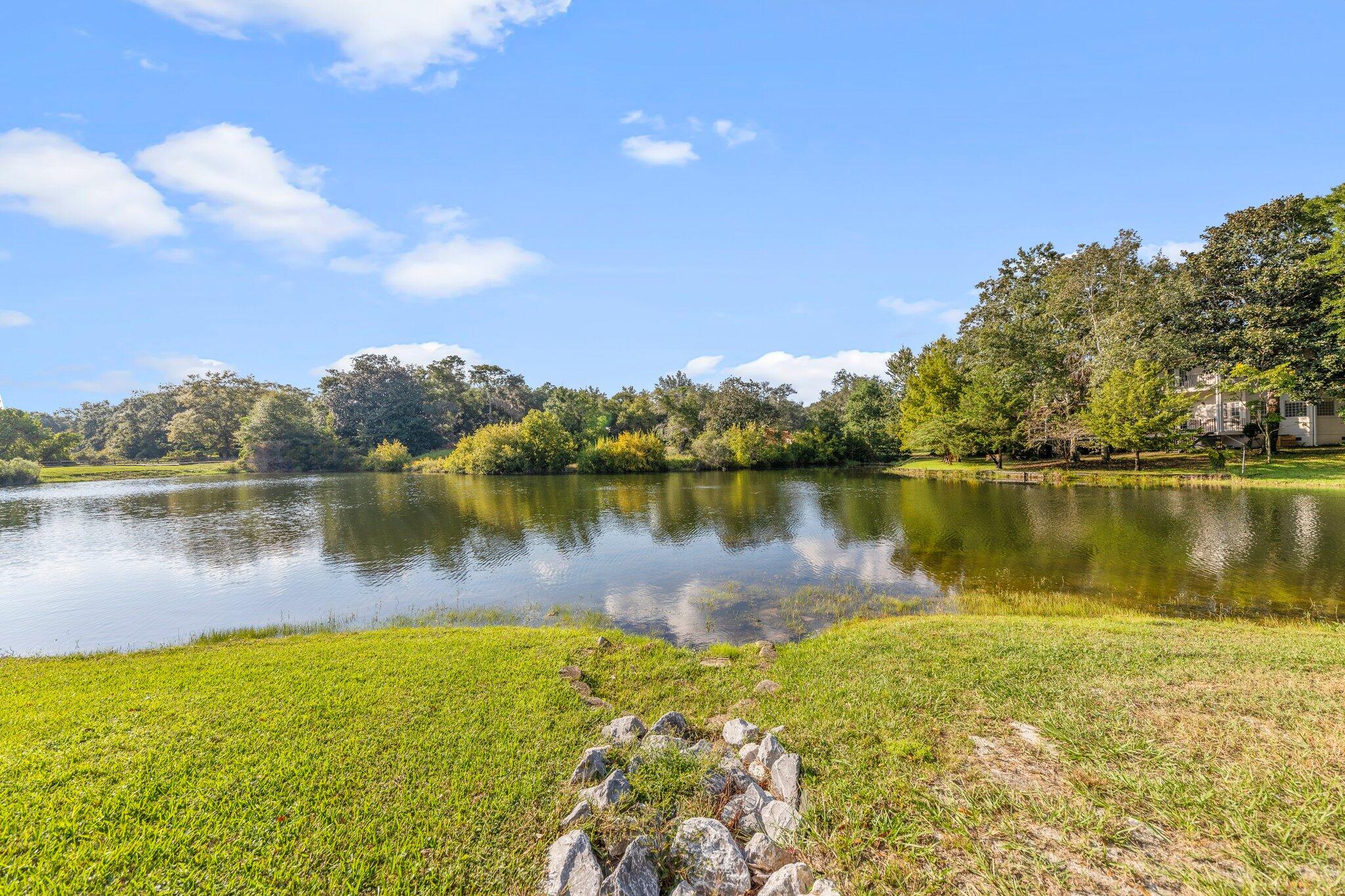 Breathtaking lake views await from this beautifully NEWLY remodeled bottom floor corner unit in Bluewater Bay. This spacious 2 bed/2 bath condo features an open floor plan that fills the home with natural light, creating an inviting atmosphere for relaxation and entertaining. The modern kitchen connects seamlessly to the living areas and large master offers serene lake views and ensuite bath. Step outside to your lakeside patio, enjoying close by community amenities like tennis courts, swimming pools, marina, and 36 holes of golf. Conveniently located near Choctawhatchee Bay and the Gulf of Mexico, east access to Destin bridge. This is a perfect for permanent residence, vacation home, or investment opportunity. The well-maintained complex provides hassle-free living with HOA management.