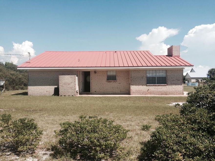 Great corner location on Wall street and Pompano in Inlet Beach. Homes sits on large lot and is well maintained with easy beach access.