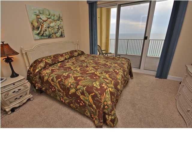 Looking for a high floor unit with penthouse upgrades on the west end? Ocean Reef 2107 has everything you are looking for! This unit is located on the 21st floor, has a GULF FRONT master bedroom & living area, has penthouse upgrades, comes with an ASSIGNED COVERED PARKING SPOT, has a HUGE balcony (one of the largest you'll find in Panama City Beach). This unit would be a great rental unit or second home for someone. The kitchen features wood cabinets & granite countertops. You will love the huge laundry area that can be used for storage or a pantry. Ocean Reef is one of Panama City Beach's newest buildings. It is located in a PRIME LOCATION on the west end of PCB, located across from the Hidden Lagoon Gulf course & very close to Pier Park. Ocean Reef has all the amenities you need such