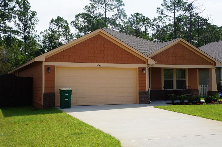 MUST SEE!! This THREE BEDROOM, TWO BATH home is conveniently located to everything in Navarre, just minutes from Hurlburt Field AFB, but still nestled away within the community of Cottages of East River. This OPEN FLOOR CONCEPT in the GREAT ROOM makes this space perfect for FAMILY GATHERINGS or ENTERTAINING FRIENDS. Kitchen has GRANITE COUNTERS with SOLID WOOD CABINETRY offering tons of COUNTER SPACE and storage; STAINLESS STEEL APPLIANCES AND HOP-UP BREAKFAST BAR just adds to this amazing kitchen space. MASTER BEDROOM has TREY CEILING and LARGE WINDOWS; MASTER BATH offers DOUBLE VANITY with GRANITE COUNTERS.