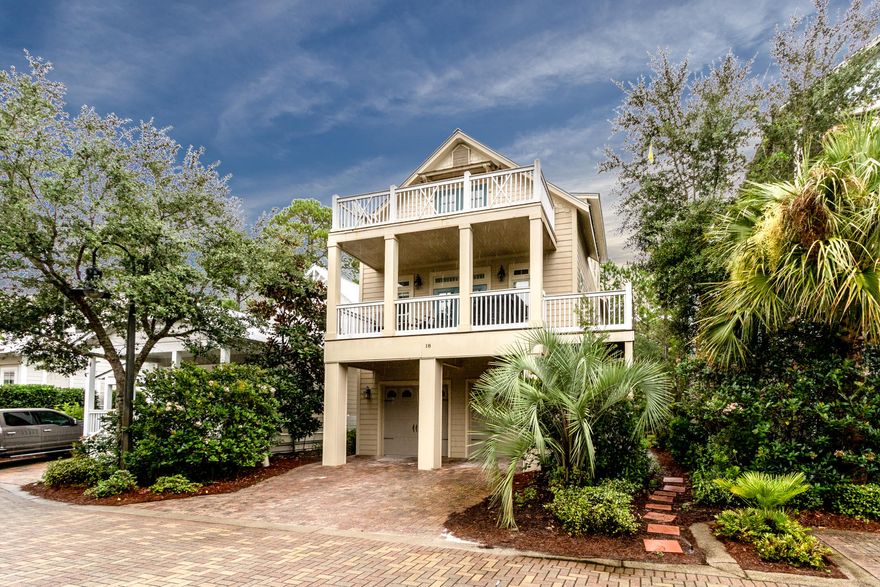 Located south of 30A in the quiet  community of Cottages at Eastern Lake, this 4BR/3.5BA home is perfectly suited as a full-time residence, second home or as a rental property.  Highlights of this home are two large private porches, 6 car-garage currently equipped as a game room with ping-pong table and pool table, four spacious bedrooms, stainless appliances, crown molding, and large welcoming living area. The Cottages at Eastern Lake community sits adjacent to Watersound West Beach and features brick paved roads, lined with palm trees and a resort style community pool.  Just a short bike ride to the beach, shops and restaurants.