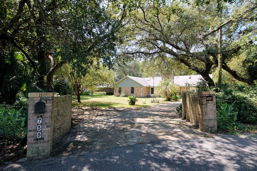 Short Sale and As-Is. Lakefront brick home in West Destin with approximately 60' on Spring Lake. Home is located on .42 acres on a Cul-de-Sac. Relax and enjoy birds, turtles and ducks from the back patio. Kayak or Paddle board in the Lake. Launch a boat at nearby Joe's Bayou that leads to Choctawhatchee Bay and the Gulf of Mexico. Close to shopping and only a few blocks from Destin Elementary School. Enter home and find a large natural stone fireplace along one wall and an open kitchen and dining area. Years ago the garage was converted to a bonus room.