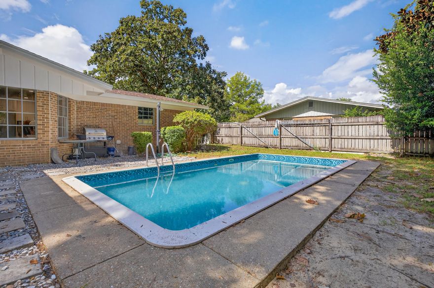 Charming home in Kenwood subdivision!Welcome to this delightful property in the Kenwood subdivision, located right in the heart of Fort Walton Beach, FL. This home is perfectly positioned for convenient access to a vibrant array of shopping and dining options, as well as top-rated schools, Eglin Air Force Base, and Hurlburt Field. Whether you're part of the military community or a first-time homebuyer, you'll find that this neighborhood offers something for everyone. This home embodies modern comfort with its brand-new kitchen featuring sleek quartz countertops, a custom backsplash, and a vented stainless steel hood. Love cooking or entertaining? This kitchen is ready to handle it all without the hassle that a kitchen makeover might usually entail. Notably, you won't find any carpet throughout the home a smart and practical choice for easy cleaning and maintenance.
The home boasts a series of thoughtful updates that add value and peace of mind. The HVAC system was updated in 2019, ensuring a keep-cool and stay-warm home year-round. The hot water heater, updated in 2014, joins a list of foundational updates including copper wiring with a new panel and breakers. This is a home that combines aesthetic appeal with sound structural upgrades.

Step outside to a private oasis in your own backyard. Enjoy the luxury of an inground pool with a new liner as of November 2024, surrounded by a privacy fence. Complete with an outdoor shower, this space is designed for leisure and relaxation, perfect for beating the heat during Floridian summers or hosting family gatherings.

The property's location is another key feature that can't be overlooked. Schools are mere walking distance away, providing an easy commute for families. For recreation, The Fort Walton Beach Golf Course is just a short drive outside the neighborhood, offering a convenient escape for golf enthusiasts. Nearby, The Landing provides a hub of activity just about ten minutes away, supplying residents with a variety of leisure options, from scenic views to community events. Medical centers, an abundance of restaurants, and other key amenities further round out this superb location.

Living in Kenwood offers not just a place to live, but a welcoming community with a rich diversity of activities and amenities. Ideal for families both growing or downsizing, this home is ready to meet your needs. Whether you're looking to enjoy proximity to work with smooth access to Eglin AFB and Hurlburt Field or you're seeking that idyllic balance of convenience and tranquility, this property has it all.
