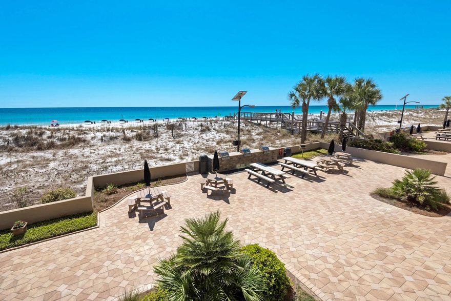 Enjoy island life from this FULLY FURNISHED 1 bedroom 1.5 bath unit at The Breakers on Okaloosa Island! GORGEOUS WATER VIEWS! Interior upgrades include tile flooring throughout (NO CARPET!), new wood panel doors and trim, upgraded bathrooms with recessed lighting, cultured marble shower and countertop in master, Kohler comfort height toilets, and upgraded hardware. Kitchen has tile backsplash, stackable washer/dryer, pantry, and breakfast bar. The dining area also has a hutch with USB outlet station that would make for a perfect dry bar or office space. HVAC 2017. Water Heater 2019. Enjoy watching dolphins play from your balcony. The Breakers complex is beautiful and well-maintained, one of the most sought after on the island. Complex features include two large community pools, fitness center with sauna, tennis courts, beach walkover, BBQ / picnic area, shuffleboard courts, and community / party room for events!