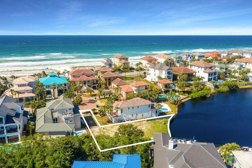 Discover this exceptional lakefront building site prominently located just a few tiers off the Gulf of Mexico in the gated enclave of Destiny West. Featuring a newly built seawall and offering an impressive building footprint, this is an ideal opportunity to secure one of the last remaining building sites along Scenic Highway 98. Notable features include a private cul de sac entry as well as a newly installed lakefront seawall with a western facing orientation to enjoy summer sunsets. Destiny Subdivision is a private, gated community with world class resort amenities and exceptional short term rental potential featuring community amenities including a clubhouse with an oversized pool and spa, workout center, tennis courts and adjacent to extraordinary public beach access.
