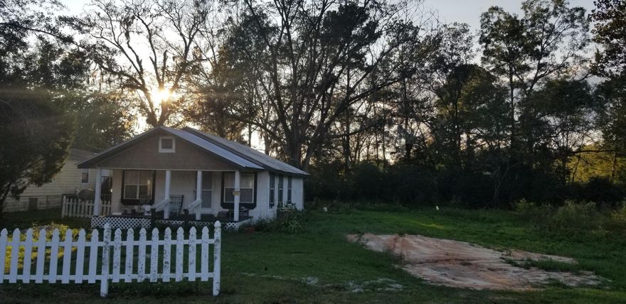 Wow! 2 BR 1 BA Cottage! 3 Lots right on HWY 79 on Main Street of downtown Vernon! Multi-use RESIDENTIAL/COMMERCIAL Property! Total of just under 1 ACRE!  So much Potential for development!*New Windows & Exterior Doors, New Heat & AC *New Electric Hot Water Heater *Connected to City Sewer & Water*Being Sold ''As is''. Seller is licensed FL Agent ***Buyer is responsible for personally verifying details about this property. Any information contained in this listing is believed to be accurate but is not guaranteed.