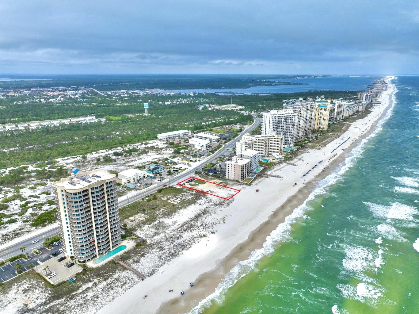 Gulf Front Hotel/Condo Development Site - Prime Opportunity in Perdido Key. With the development order already approved, this property presents a turnkey opportunity for investors in the coveted Perdido Key area. This Gulf Front site spans an impressive 1.99 acres and boasts an approved development order for an elegant 14-story hotel/condo complex with a total of 50 units, offering 128 keys for hotel guests and condo owners alike.  This development will feature a full-service restaurant, beachfront pool with cabanas, fitness center, state-of-the-art conference center with private meeting rooms, banquet room, and a three-story covered garage parking for up to 140 vehicles. 

Perdido Key is renowned for its breathtaking Gulf views, sugar-white sandy beaches, and a serene coastal ambiance. This development site offers investors the chance to be part of a thriving community with endless recreational opportunities, from water sports to dining and entertainment. Don't miss out on this rare chance to shape the future of Gulf-front luxury living in one of Florida's most sought-after destinations.