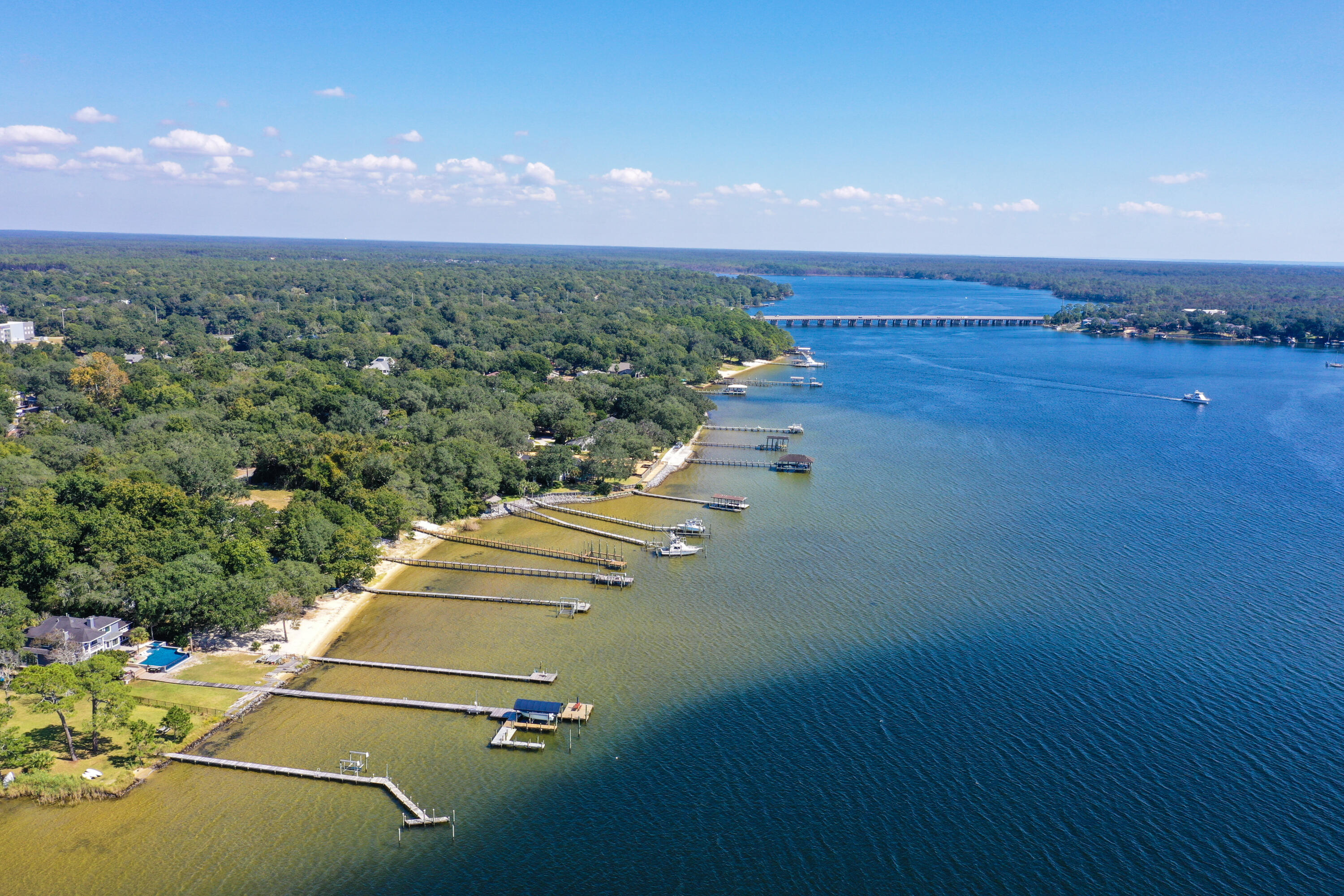 Discover your chance to own waterfront property on this .17-acre lot, directly situated on Rocky Bayou in Niceville, Florida. This property offers direct access to Rocky Bayou, which flows into Choctawhatchee Bay, providing ample opportunities for boating, fishing, and waterfront recreation. Embrace the sought-after Niceville lifestyle with this unique land parcel.  Please note: Assessment and new buyer fees will apply as the developer finalizes community details.