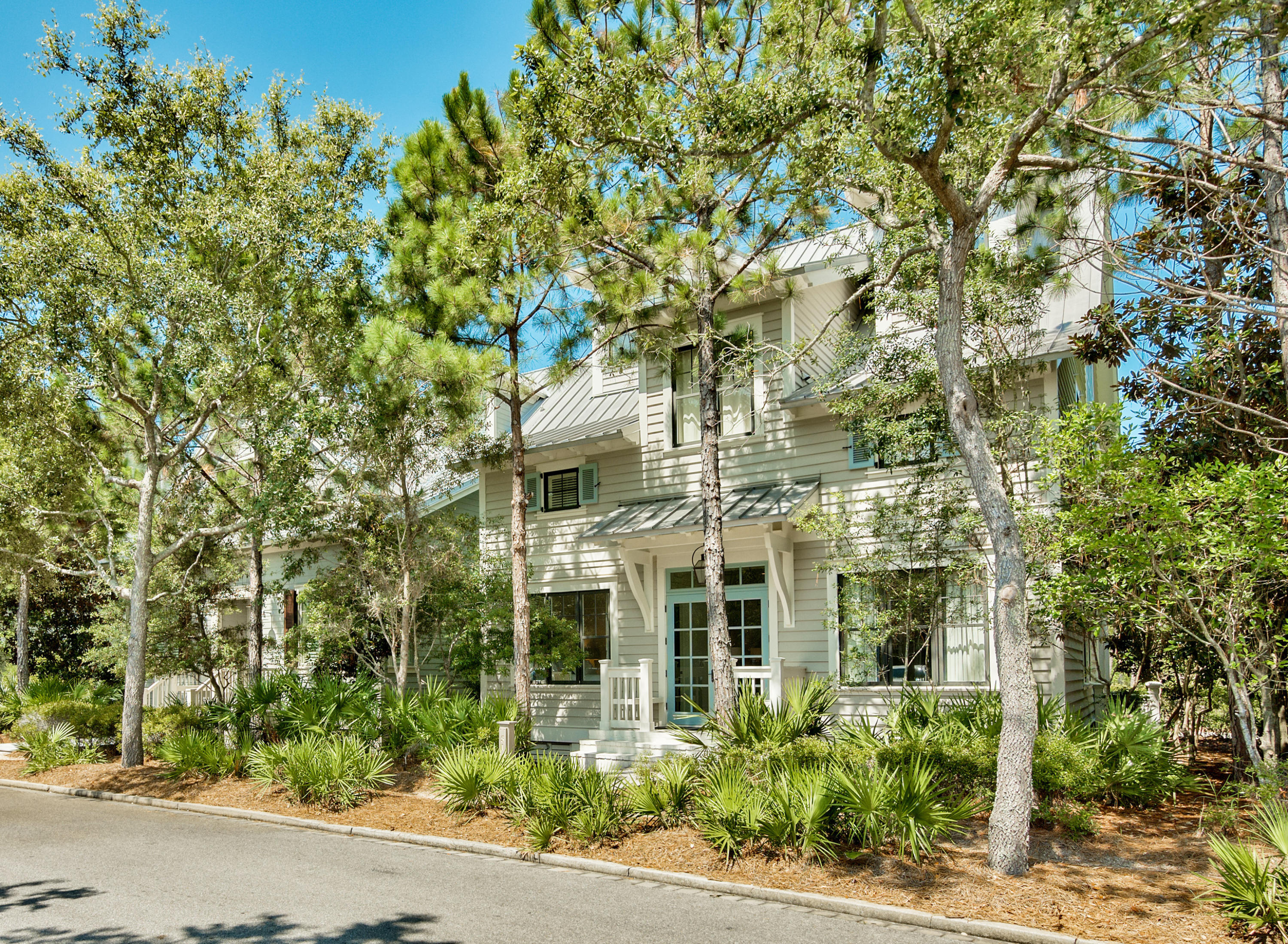 Priced to SELL! Well-priced, luxurious WaterColor residence, prominently situated south of 30A ​in the premier location of the exclusive Park Row ​neighborhood offers three stories of extraordinary living space. Offered fully furnished with interiors by Suzanne Kasler. Overlooking the Gulf of Mexico, Grayton Beach State Park and Western Lake, this ​exclusive and private south of 30A ​location is rarely available. Designed with exquisite detail, this five bedroom, five full private bathroom home offers forever views and stunning sunsets. The first floor offers two spacious guest suites with private, spa-like baths outfitted with premium WaterWorks plumbing fixtures, classic marble countertops and sleek glass tile. Crisply painted wood walls and a single piece, wroug