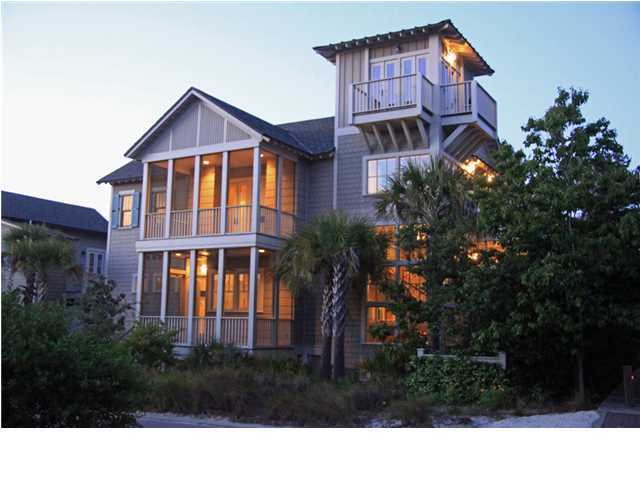 INVESTORS TAKE NOTE : Never been rented, but rental projection by 360 Blue is $130k annually. Valuable extra large corner lot location,very close to lots currently listed at close to $2m, with great curb appeal, only 4 lots from the beach, beautiful views, and a pedestrian boardwalk outside your front door leading to the one mile of dedicated neighborhood beach, all within the prestigious Dune Ridge neighborhood of Watersound Beach. Designed by Jonathan Lawrence and built by Ray Jackson, the attention to detail is evident in the cypress ceilings, built in bookcases, wood walls, moldings, custom cabinetry and designer finishes. The focal point of the living and dining is a custom designed floating spiral staircase framed by three stories of windows. This dramatic feature leads to a