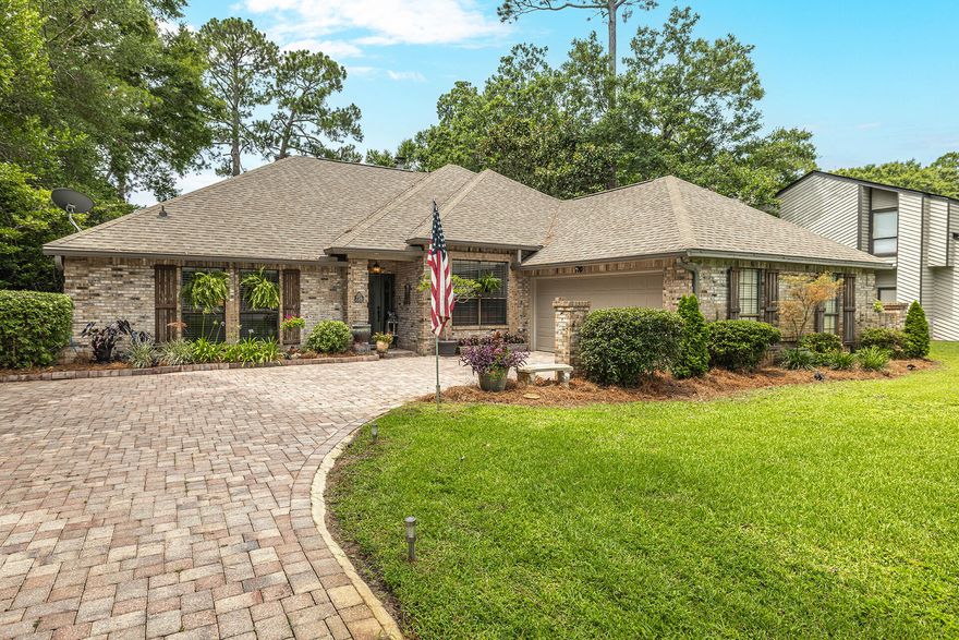 STUNNING REMODELED 4 bed / 3 bath golf course home, located in sought after Bluewater Bay!  
Great curb appeal greets you with beautiful landscaping and brick paver driveway.
Two living areas with the first featuring a gorgeous fireplace, modern farmhouse chandelier, tile flooring, and picture windows overlooking the expansive back patio. 
Beautifully updated kitchen with granite countertops, tile back splash, white cabinetry, and stainless steel appliance package. The kitchen overlooks the second living space and includes a charming breakfast nook. The spacious primary bedroom has LVP flooring, and private access to the back patio. Luxurious en-suite bathroom has been remodeled to feel like a spa retreat with double sink vanity, soaking tub, separate custom tiled shower, and walk-in closet. 
The split bedroom floor plan features a junior suite on the other side of the home- large bedroom with His & Hers closets, and private remodeled en-suite bathroom.
The additional two bedrooms share a gorgeous Jack-and-Jill bathroom with double vanity, and tub/shower combo with tile surround. 
Relax and unwind in the beautiful backyard with golf course view and large covered patio. This home comes complete with a 2-car attached garage.