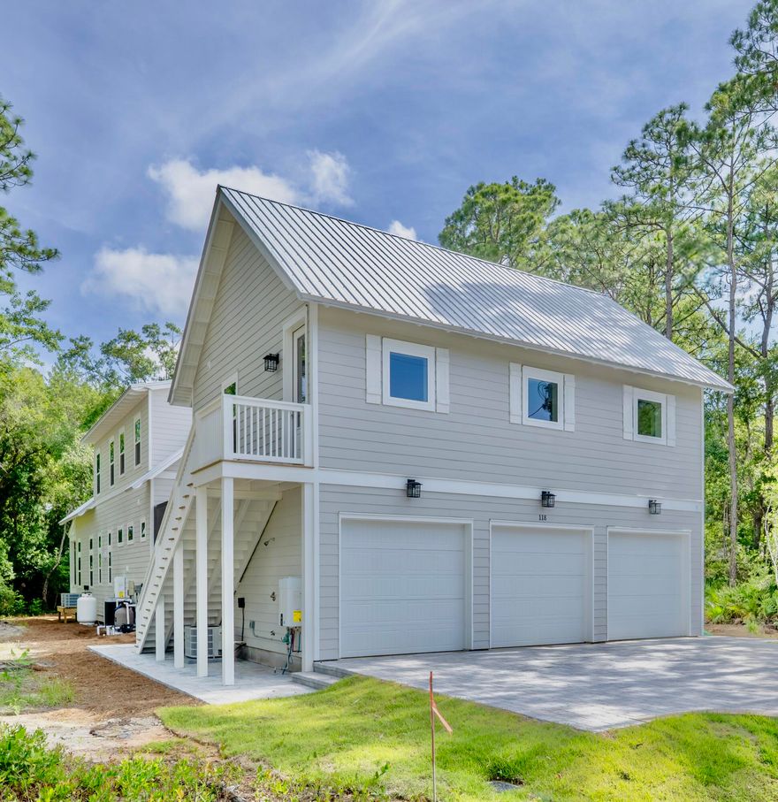 Gorgeous 5 bedroom, 4.5 bathroom home in a lovely area of Pt. Washington with a three car garage in the carriage house. The main house features 3 bedrooms and 3.5 bathrooms. The kitchen, living and dining room are perfect for entertaining with an open concept, huge island and gas fireplace. The walk-in butler pantry includes ample shelves as well as a beverage cooler. The luxurious master suite is located on the first floor and features a soaking tub and oversized shower. The laundry and half bath are also located on the first floor. The second floor of the main house includes two guest suites with private bathrooms and an additional living area. The carriage house features a full kitchen, living area, two bedrooms and one full bathroom on the second floor above the oversized garage. The