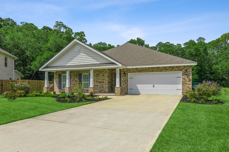 Like new, immaculate, single-level smart home in the popular Peach Creek subdivision. The 'Victoria' floor plan is 2306 sq ft and offers 4 nice size bedrooms, 2.5 bathrooms and a lovely open floor plan. Additional features include vinyl plank flooring (common areas), whole house water softener system & reverse osmosis water purifier, Rachio sprinkler system just to mention a few. The chef in the family will enjoy the upgraded appliances including the Bosch Dishwasher, Kitchenaide Range (gas using propane w/rented tank) and Refrigerator. A gorgeous backsplash accents the bisque cabinets and the island offers additional seating. The split bedroom floor plan offers privacy and convenience. Owners suite enjoys a spacious bathroom and walk-in closet (with added electrical outlets).
