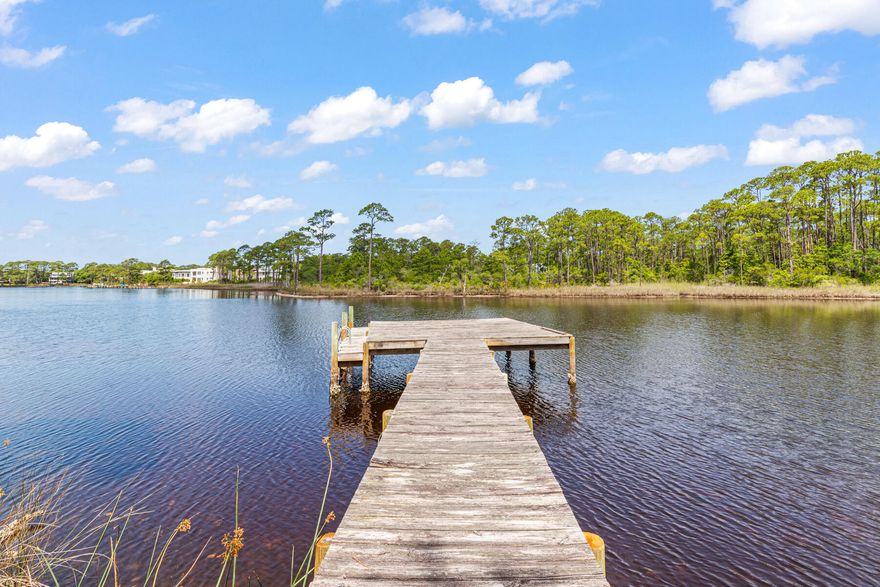 One of the largest Coastal Dune Lake properties on the market (over 1/2 acre) with 135 feet of water frontage surrounded by Grayton Beach State Park. Make this your legacy home to build generational wealth and memories for a lifetime.  Boat or paddle board to the beach or to the Hotz Avenue ramp and go to the Red Bar or Chringo.  There are only 5 lake front lots in Old Miller Place subdivision and rarely does a private lake front lot ever come on the market. The two bedroom, two bath cottage is adorable.  Keep it or tear it down and build your forever home. Sale comes with complete building plans and wetland studies!  Sold AS IS with a short exclusion list. No short-term rentals allowed.  If you are looking for privacy on Western Lake, look no further!!! All measurements are estimates and should be verified by the buyer.  Please call listing agent for an appointment.