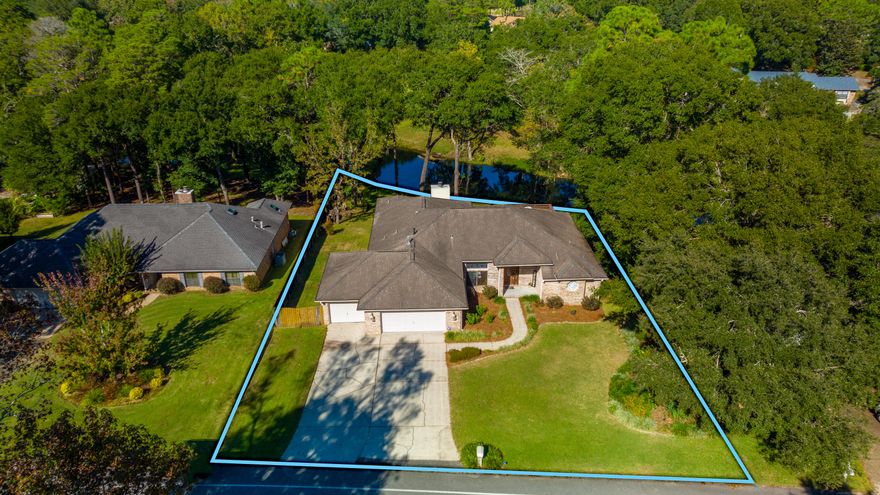 BACK ON THE MARKET NO FAULT OF SELLER. What an incredible find in Rocky Bayou.  112' waterfront beauty.  Lennox 14 SEER HVAC 2017, Rinnai Tankless hot water heater 2011, and Roof 2008 with barrier under shingles.  4 bedrooms, 3 full bathrooms, 3 car garage and 1000 sq ft. of decking across the back of the home overlooking the water. Large kitchen with an incredible center island, breakfast bar, built in desk area, will meet any chef's needs.  Primary bedroom suite offers a sitting area, and 2 large walk in closets. The primary bathroom has two separate sink areas, a walk-in shower and a garden tub.  Garden tub is enhanced by a beautiful octagon window over the tub. Great room has a wood fireplace with a cast iron insert for continued warmth throughout the winter.