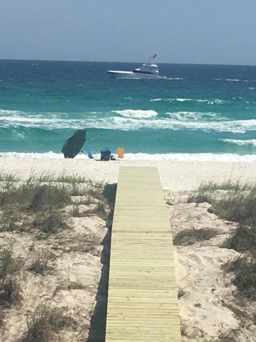 Renovated Navarre Beach Townhouse (End Unit) with a private boardwalk directly to the Gulf! NO HOA! Water views from every bedroom & main living spaces! Master bedroom suite (with Gulf views & private balcony) has its own split unit HVAC. Remodeled kitchen with marble counter tops along with Italian fired ceramic Farmhouse sink, Professional Gallery appliances to include microwave, smooth top range, dishwasher & French door refrigerator with Icemaker on door & bottom freezer drawer. White shaker cabinets with soft close & upgraded glass handles & pulls. Enjoy the downstairs open air covered & fenced patio with 2 large picnic tables, bar, new grill & outdoor shower. Or relax on the upstairs deck with an outdoor glass fire pit & enjoy the Emerald Coast water & white sugar sand beach!