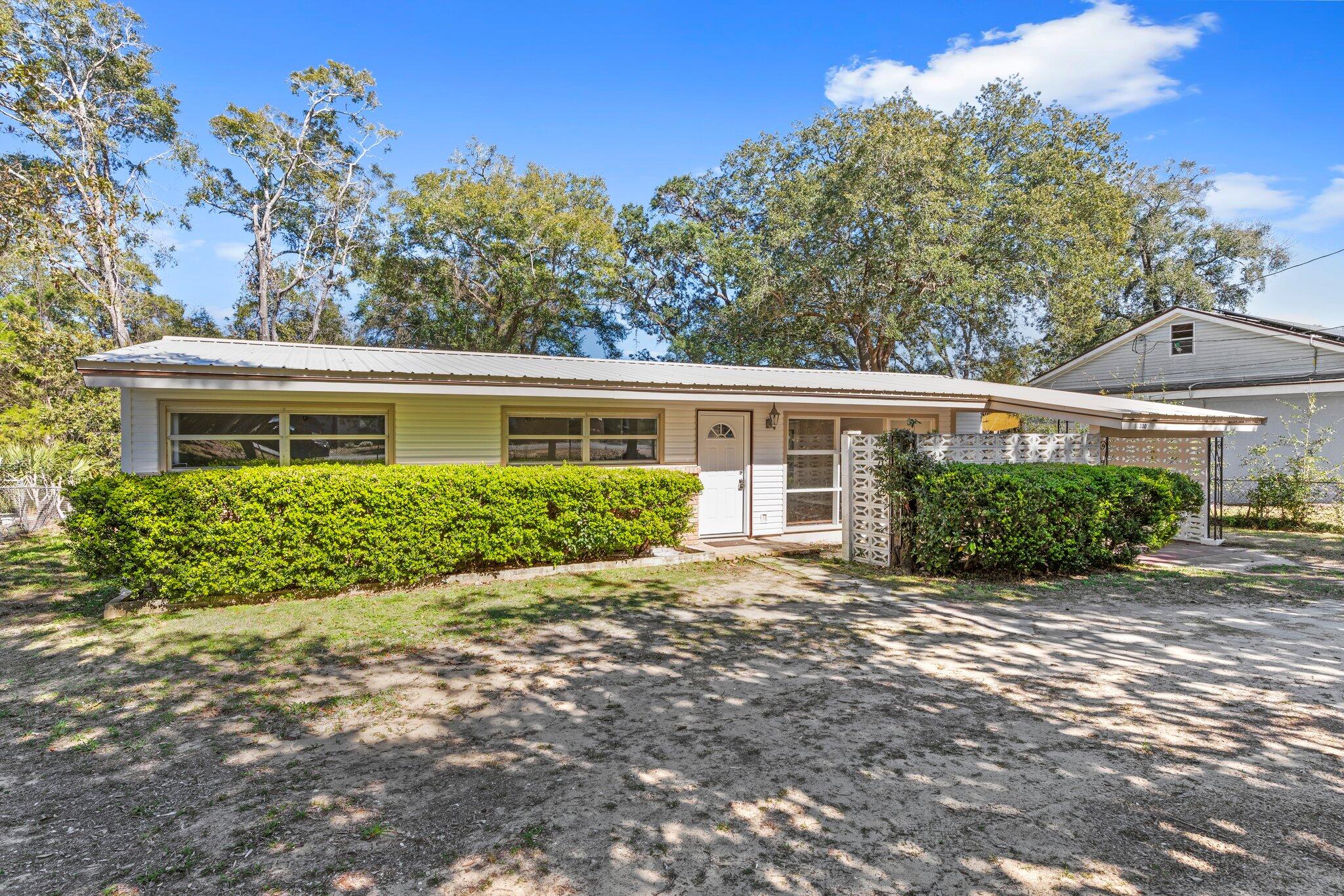 Fresh Paint! New LVP Flooring! Large private fenced yard front and back. Two living areas. Don't miss this home under $300,000 in the heart of Valparaiso. Metal Roof 2012, AC 2015.