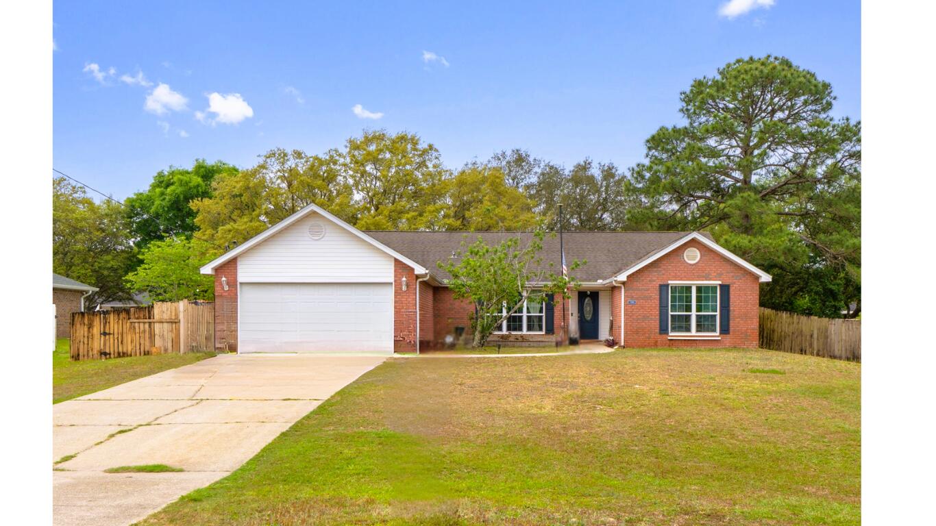 New roof to be put on prior to closing! This 4/2 has a split floor plan, and a huge, beautiful sunroom!  Freshly painted throughout, granite kitchen counters, wood burning fireplace, cathedral ceilings, and the driveway will fit 6 cars! HVAC is 2018, and water heater is 2024. There is a peach tree in the front yard, large flat backyard with a shed, and did I mention the huge and beautiful sunroom?!  It's a must see!  Buyer to verify any and all information that is important to them.