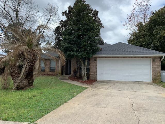 Beautiful brick home on a quiet cul-de-sac with a 2 year old, architectural shingle roof. Open floor plan. Kitchen with bar and large eat-in area with french doors leading out to a deck. Dining room has trayed ceilings. 8X5 tiled entry with leaded glass front door. Living room has vaulted ceiling and a fireplace.. Hall bath has a double vanity and 2 linen closets. Split floorplan. Master suite has vaulted ceilings, Dual sinks, and separate shower and tub. The large yard has a privacy fence, lawn pump with sprinkler system, and a 21X7 covered patio. The two car garage has a hurricaen rated door. The HVAC is 2020 and the roof is 2022.