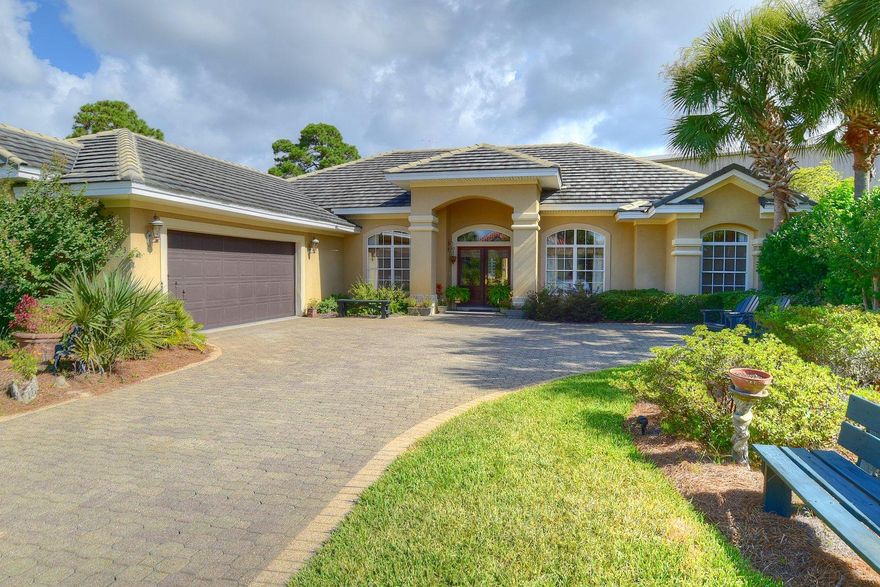 PRICE REDUCTION ON THIS STUNNING MUST SEE HOME IN DESTINY EAST. HERE ARE JUST SOME OF THE OUTSTANDING FEATURES: TRAVERTINE FLOORS, GORGEOUS MILL WORK, BUILT IN BOOK CASES, 12 FOOT CEILINGS, CROWN MOULDING, OPEN KITCHEN WITH DOUBLE CONVECTION OVENS, COOK TOP IN ISLAND, ALL STAINLESS PROFESSIONAL APPLIANCES AND SECURITY SYSTEM. (NOTE: REFRIGERATOR, WASHER & DRYER NOT INCLUDED) ALL CLOSETS HAVE CALIFORNIA BUILT-INS, SURROUND SOUND, OVERSIZED GARAGE WITH BUILT IN WORK CABINETS,IN GROUND POOL WITH AWESOME COVERED LANAI AND FANTASTIC LANDSCAPING. TREMENDOUS STORAGE IN THIS HOME AND THE 4TH BEDROOM COULD BE USED AS AN OFFICE.