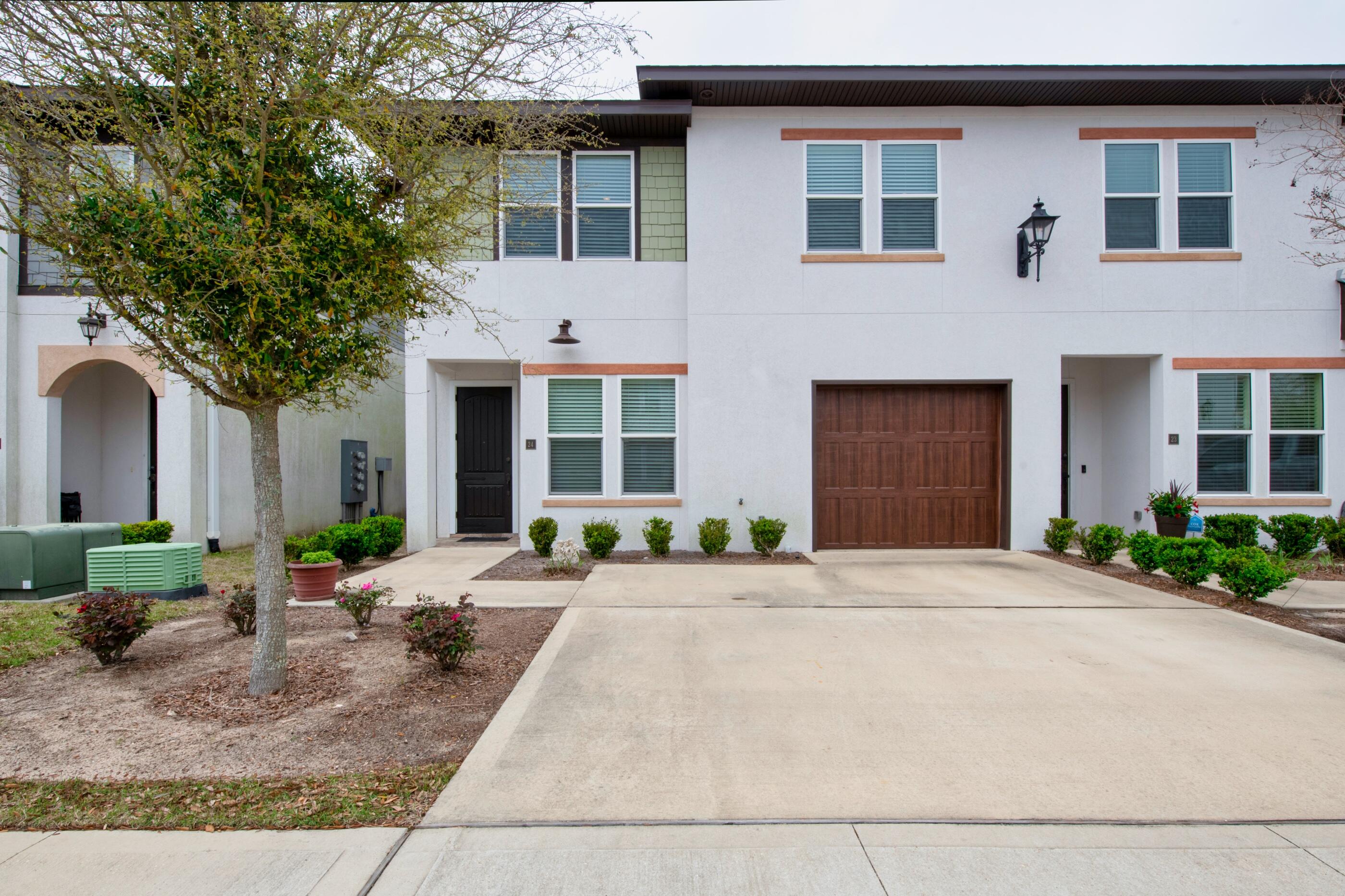Welcome to the exclusive gated community of Destin Oaks! Built by local builder, John Cunningham. 2062 sq ft of living space in this gorgeous townhome in central Destin. High impact windows and doors, stainless steel appliances, walk in closets in ALL bedrooms Walk in Master shower and separate tub. All wood cabinetry and granite counter tops in the kitchen and baths. Two Carrier AC units, heat pump water heater which helps keep the garage cool upgraded carpet and best carpet pad In addition to these, MANY UPGRADES were added to this property by the present owner. (See attachment) You won't believe the quality in this home! Enjoy the neighborhood pool and clubhouse and Florida living at its best! The beautiful beach and the Harbor are just minutes away from this location