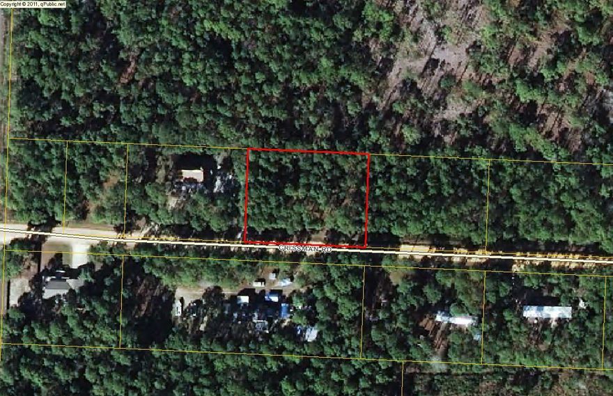 Beautiful double lot close to the bay on a private paved road. Great opportunity to build your dream home close to shopping, dining, the bay and beach. Dimensions are approximate and need to be verified by buyer.