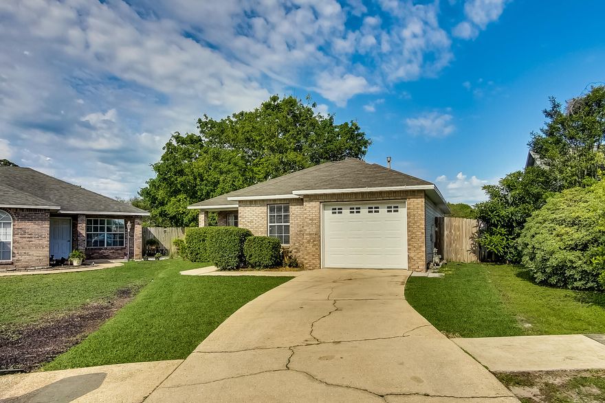 This charming 2 bedroom 2 bath home is located in the heart of old Destin in a quaint cul-de-sac neighborhood  just five minutes from the beach. Built in 1993, this 1011sf home has a brick front exterior and a beautiful and private fenced back yard with brand new decking. Inside you will find an open floor plan boasting natural light and a recently renovated kitchen with stainless steel appliances, quartz countertops, and a gas stove. The master has a walk in closet with custom shelving.