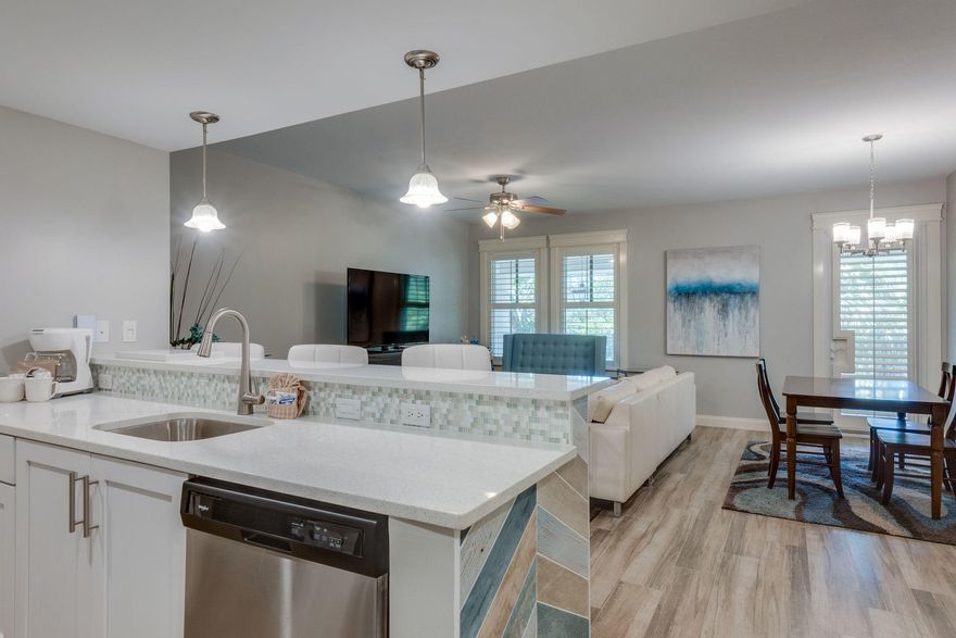 Gorgeous updated condo in a unique location with a long balcony under the Grand Terrace facing the Grand Gardens. Relax in the shade after a long day at the beach. Offered fully furnished. Just bring your suitcase! This condo is larger than most at 821 sq. ft. A large living area makes a family game night or movie night even more enjoyable. Cooking made easy with the ample counter space in the kitchen. The Grand Sandestin welcomes you with gracious architecture and luxurious amenities including a fitness center, swimming pool, Also enjoy being adjacent to the Village of Baytowne Wharf with lots of shopping, dining, and daily & nightly activities for the whole family.As an introduction to the Sandestin lifestyle, we invite our new owners to explore amenities that make Sandestin special.