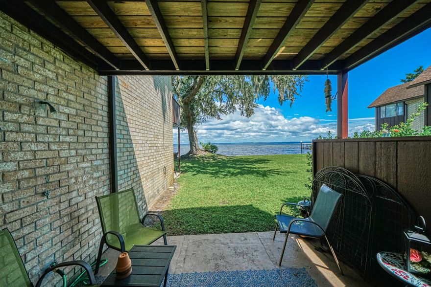 Live on the Bay in this spacious 3 bedroom, 2 bath town home. Sliders in family room face  the water and lead to Bay view patio with views of community dock. Enter the spacious living room from an  enclosed courtyard . Hallway leads to an Eat-In Kitchen and dining area/Family room. Two upstairs bedrooms share a Bay front balcony while the third upstairs bedroom's balcony overlooks the beautiful grounds & a view of the water. Recent updates include: new copper wiring, and updated kitchen and baths.  Mossey Cove is a quiet, serene waterfront community with beautiful Magnolias & oaks draped with Spanish Moss. Amenities include boat launch, community dock, swimming pool, tennis courts, community room, reserved parking and guest parking.