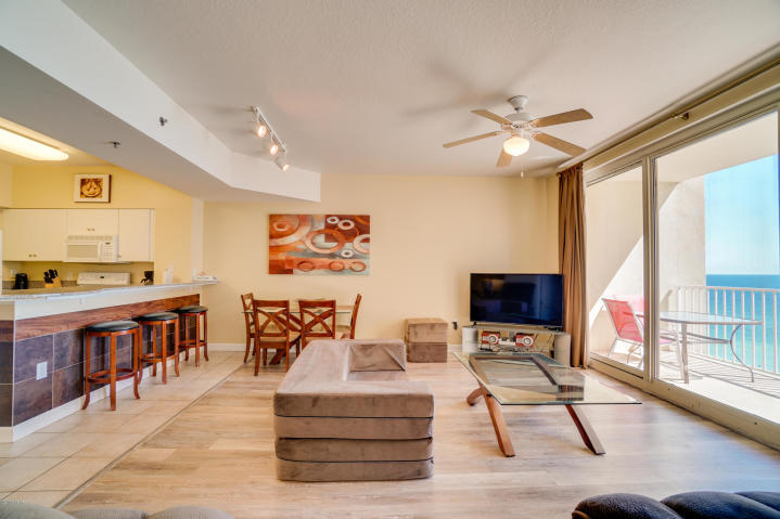 The beach getaway you've been dreaming of at the popular resort destination - Shores of Panama! This beach inspired 1 bedroom + bunkroom, 2 bath Gulf front condo conveys fully furnished. Incredible views from this coveted '17 stack location. This spacious 907sq.ft., ''Type C'' unit features the kitchen open to living area and master bedroom on the Gulf. Sleeps 6 including bunk room. Sunshine and warm gulf breezes abound from the unit's large, wide balcony. Conveys with parking space! The Shores of Panama offers resort style amenities including 13,966 SF Gulf side pool and hot tub, large heated indoor pool & hot tub, health and fitness center, spa, sauna, massage therapy and steam room, 2 tiki bars serving lunch and dinner, Kids Club activity program, meeting spaces, covered parking deck