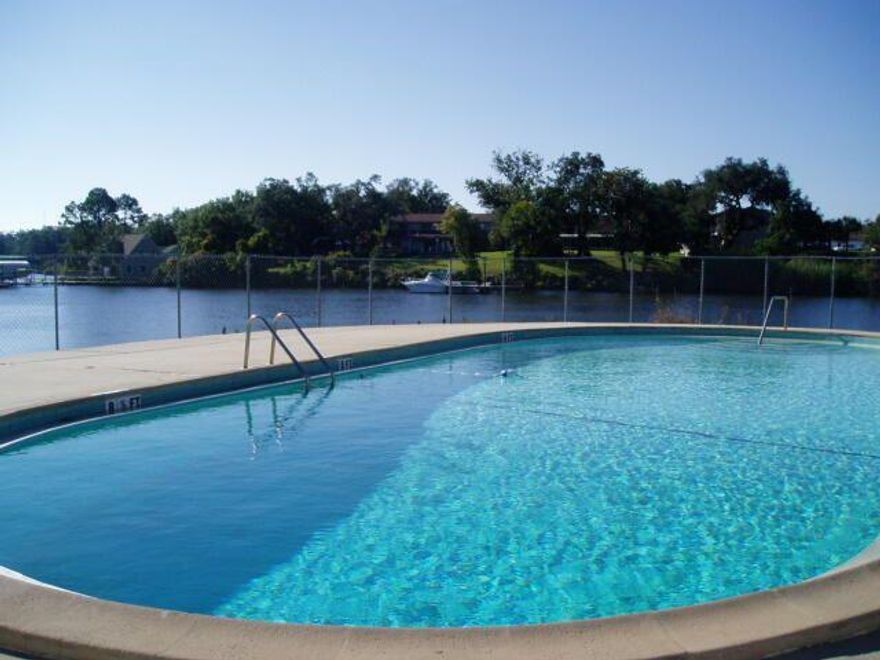 CONVENIENTLY LOCATED APARTMENT COMPLEX WITH POOL, LAUNDRY FACILITIES ON SITE, TENNIS COURTS, ON THE BAYOU. NEWER APPLIANCES AND FLOORING THROUGHOUT. Water, Sewer and Garbage are included in the rent.  This is a first floor unit with has a small private  fenced patio off the kitchen . THERE ARE NO PETS ALLOWED-NO EXCEPTIONS. Great location. Centrally located in FWB, convenient to both bases and area shopping. Community pool  and laundry room are on  the bayou/waterfront area.  Listing office associate to accompany all showings