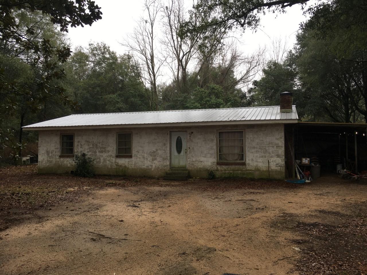 Country Home with lots of upgrades and some remodeling still to be completed. Roof, A/C Unit, Energy efficient Hot Water Heater, spray insulation all completed in 2016. This home has TONS of potential and is a must see for anyone wanting to live the Country life and still be close enough to the City!!