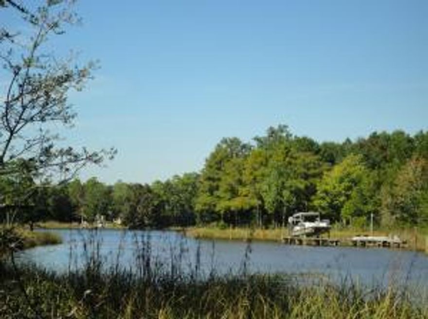 Approximately One Acre With 354' Of Water Frontage! This elevated, wooded homesite is located on a protected arm of Mallet Bayou just minutes from the Bay. It is conveniently located off Hwy 331 just 5 minutes from South Walton's pristine beaches, shopping, restaurantsand hospital. It measures close to an acre and boasts of tall pines, live oaks and magnolias. There's No build-out time and No HOA due. With its convenient location, serene natural setting and competitive price, this is a great ''buy and hold'' opportunity for a boating enthusiast.