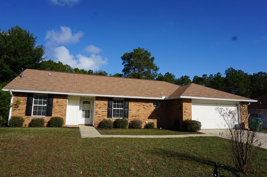 Cute South Crestview home makes commuting to bases, beaches and shopping a breeze.  .