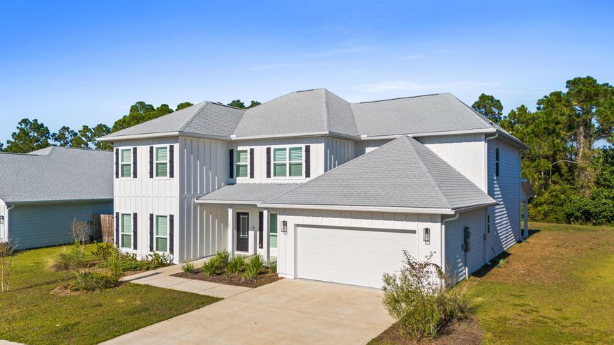 Discover modern coastal living in this stunning 6-bedroom, 4-bath contemporary home in a desirable new Panama City Beach neighborhood. Just 5 minutes from the beach and Pier Park, this spacious residence features elegant upgrades throughout, including premium flooring, sleek quartz countertops, and abundant natural light from expansive windows. Perfect for entertaining or family living, the open-concept layout flows seamlessly to a large quarter-acre lot, ideal for outdoor living or future pool plans. Enjoy comfort, style, and convenience in this beautifully upgraded coastal retreat.