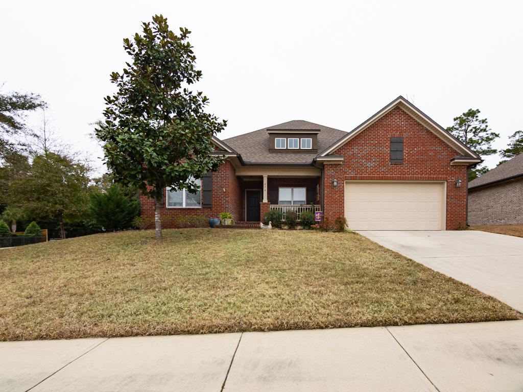 Bring your boat or RV! This beautiful 4 bedroom 3 bath brick home on a .44 acre corner lot has a double gate into your huge backyard! Pull your boat or RV in with ease and still have plenty of room for the kids to play. There is even room to add a pool. What a rare opportunity to own a lot like this in such a new neighborhood! The kitchen has a ton of counter space, an island, a breakfast bar and is open to the living room which makes this home perfect for entertaining. There is even a screened in porch. All three bathrooms also have granite and each guest bedroom has a double door closet. The master is on the back of the home and has a gorgeous attached bath with garden tub, separate shower and double vanity. There is a sprinkler system for the yard and a termite bond on the home. Buyer