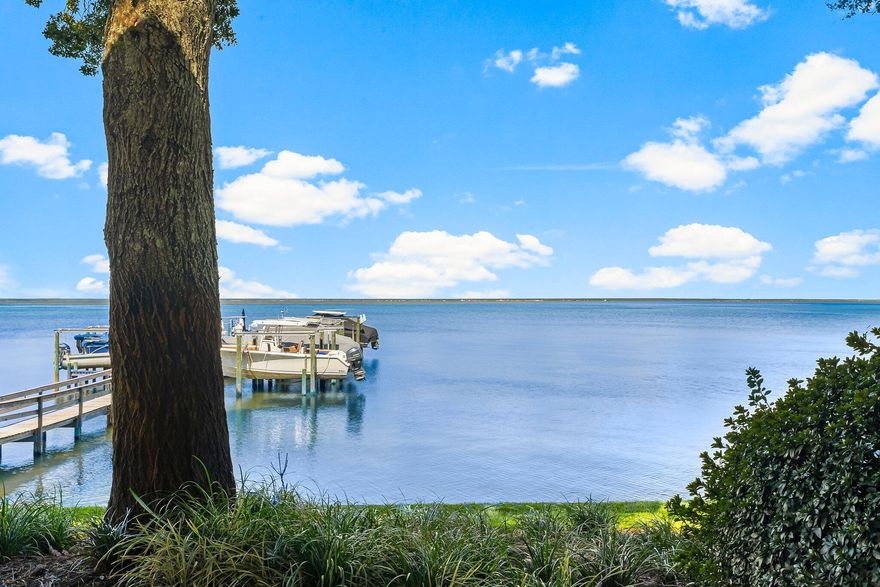 Million Dollar Views Await You! See the unparalleled beauty of Choctawhatchee Bay in this exclusive waterfront community. Rarely do first-floor units become available, and this gem won't last long! Whether you're looking to downsize or searching for the perfect second home, this condo offers everything you need for serene living. Short term rentals are not allowed! Key Features include:Open Floor Plan: This spacious, newly painted, 2-bedroom, 2-bathroom unit features 11' ceilings and an abundance of windows, creating a bright and elegant atmosphere. Newly installed sound-proofing and shiplap in the primary bedroom for extra privacy.Waterfront Access: Steps away from boat access, each unit has an assigned boat slip that can hold up to a 27' boat. perfect for quick rides to Crab Island. Prime Location: Situated on the highly desirable ground floor in a low-density condominium with only 12 units. Outdoor Living: Enjoy your 280 sq. ft. lanai, where you can sip your morning coffee while watching dolphins and herons as the sun rises over the bay.

Parking Convenience: Includes one covered parking space right in front of the unit, plus additional parking for guests.

This property combines luxury with tranquility, offering breathtaking views and effortless access to the best of Florida's Emerald Coast. Don't miss this rare opportunity, schedule your showing today!